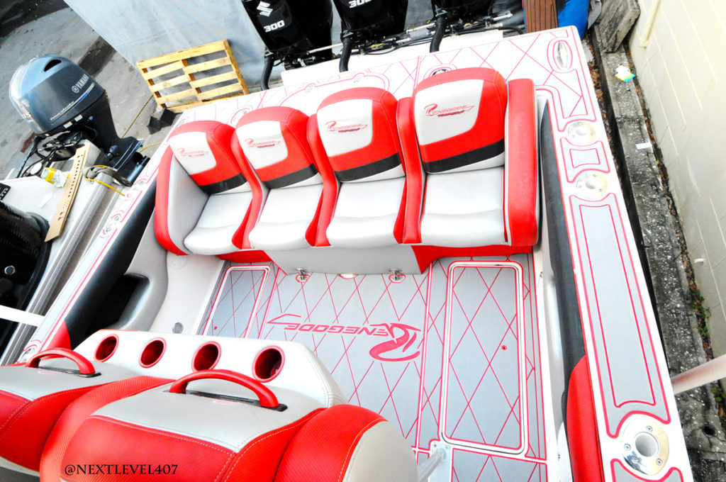 Red-Renegade-Boat-2-Sea-Dek-Marine-Flooring-Pad-Customized-Red-With-LogoDriver-Side-Acrylic-Dash-Radio-Garmin-Moniter-Back-Seats-3-Suzuki-300-Engines-2