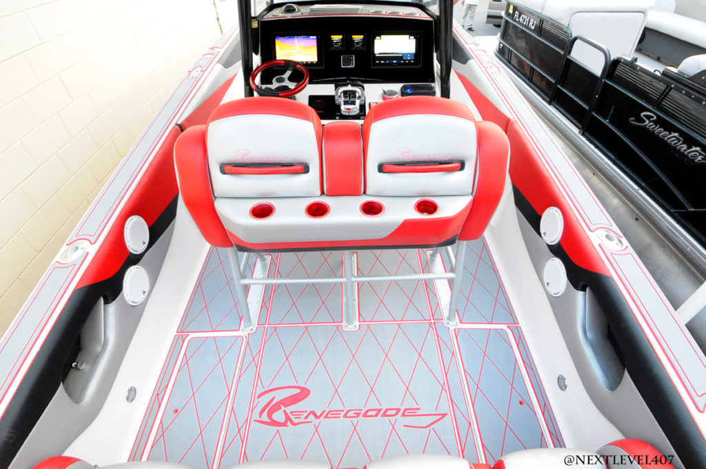 Red-Renegade-Boat-2-Sea-Dek-Marine-Flooring-Pad-Customized-Red-With-LogoDriver-Side-Acrylic-Dash-Radio-Garmin-Moniter-Back-Seats-Close-Up